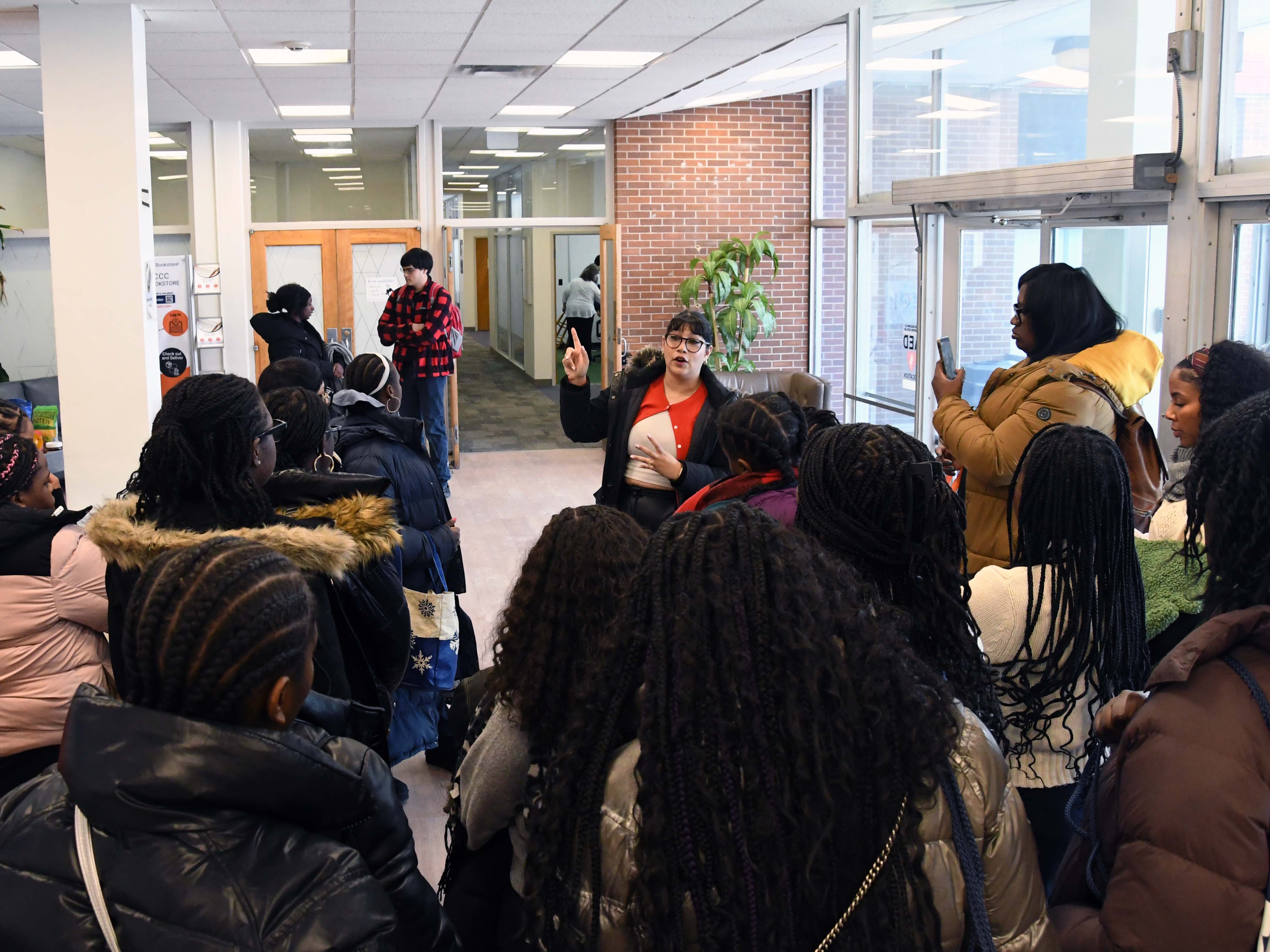A group of students touring inside a building